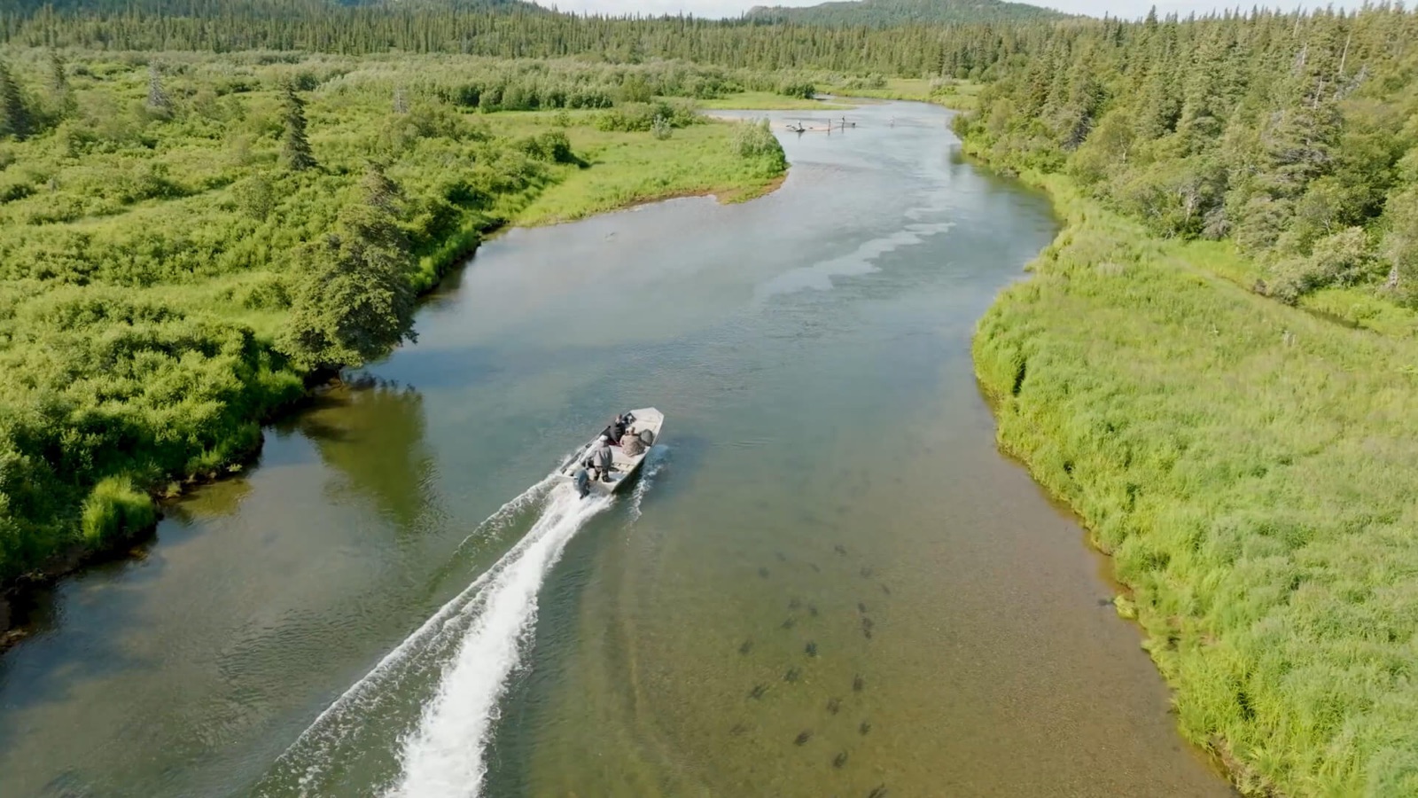 A guide boat running a river at Legend Lodge, Alaska