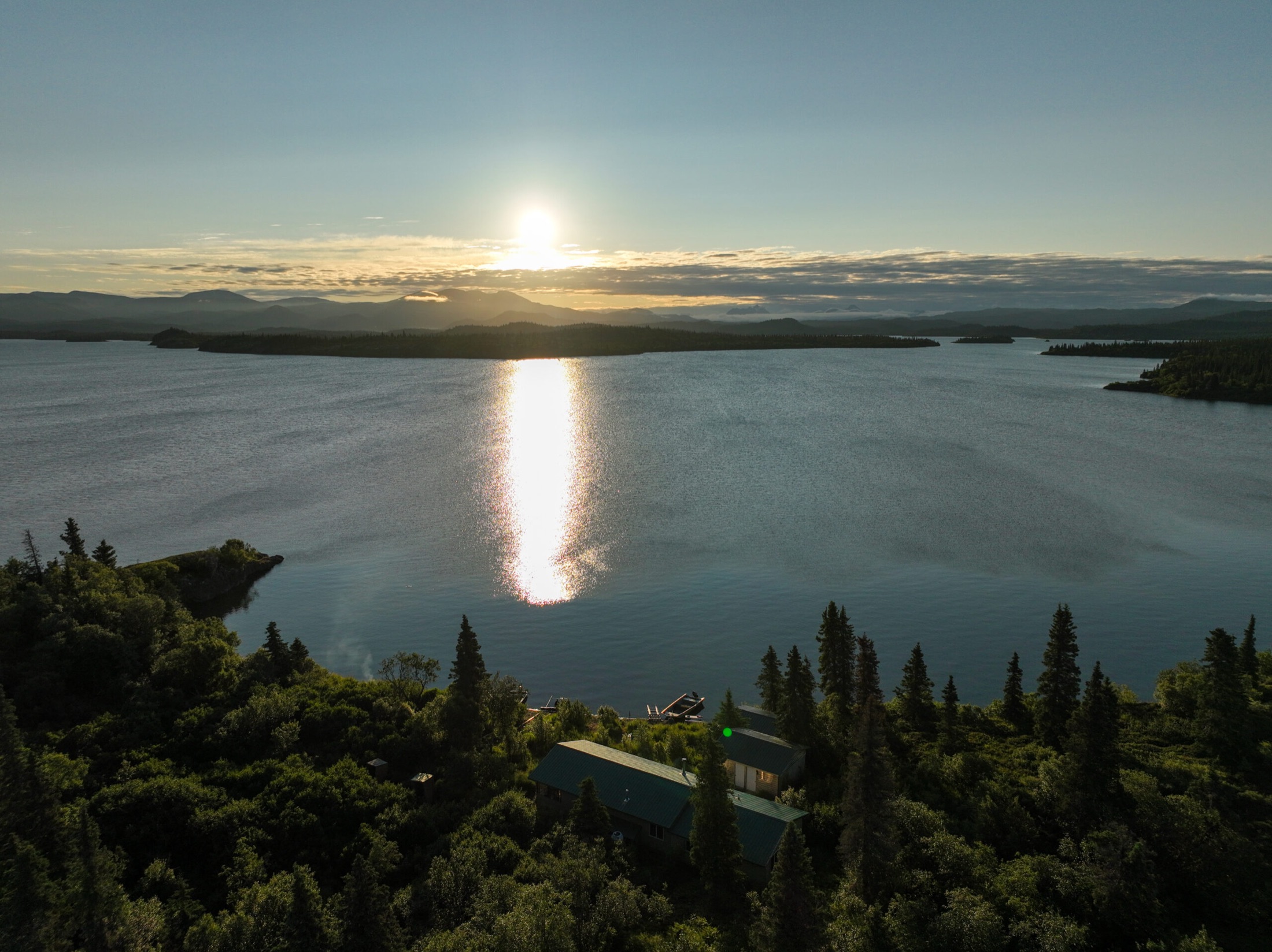 Aerial view of Legend Lodge on the shore of Lake Iliamna, Alaska at sunset