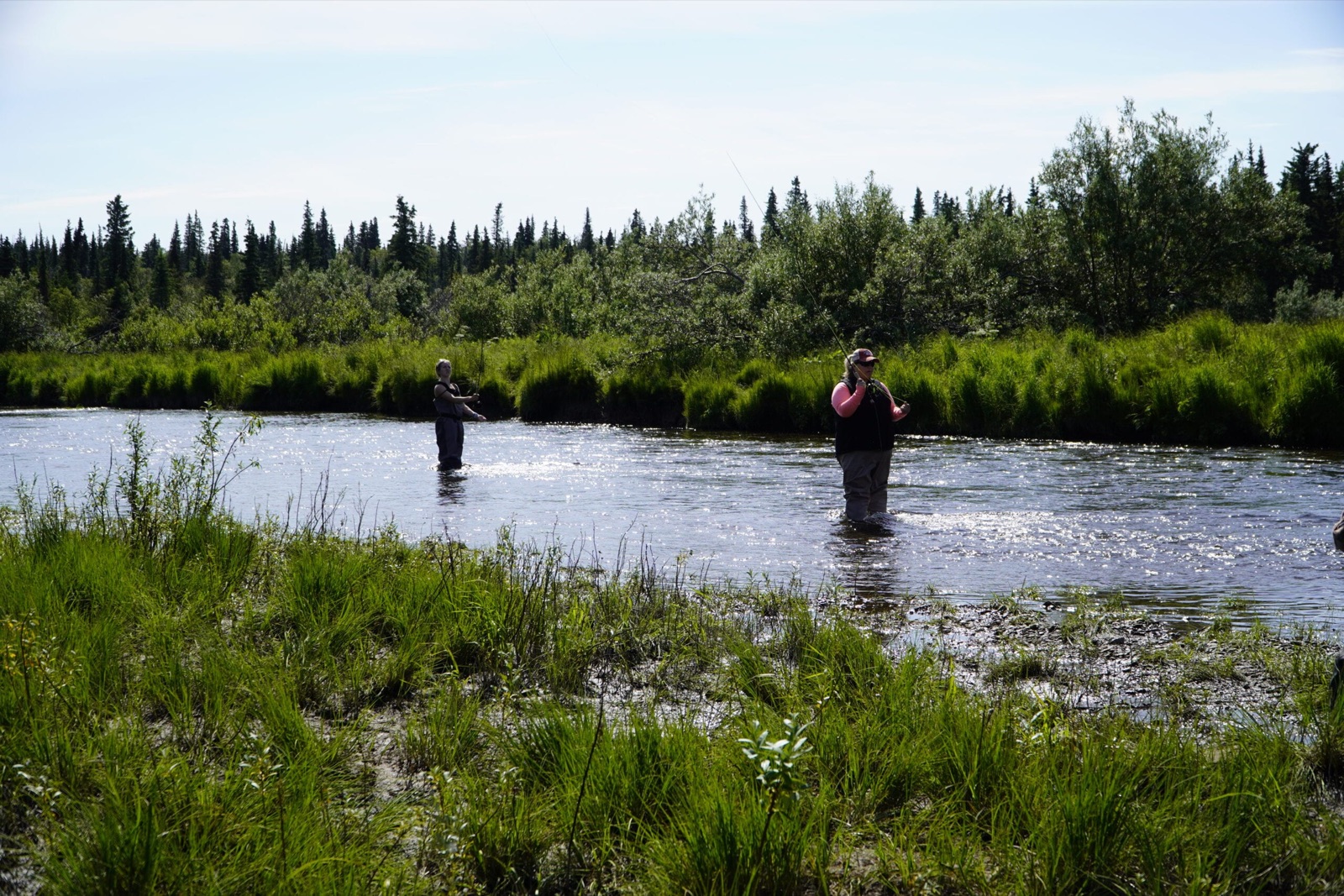Two anglers working a quiet side channel